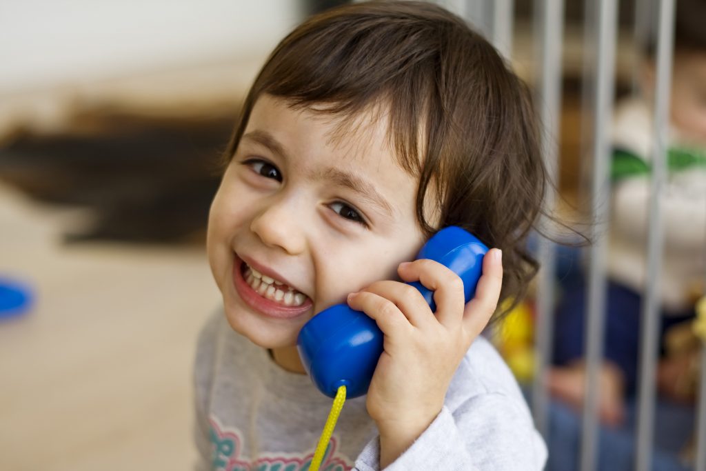 Child using toy phone